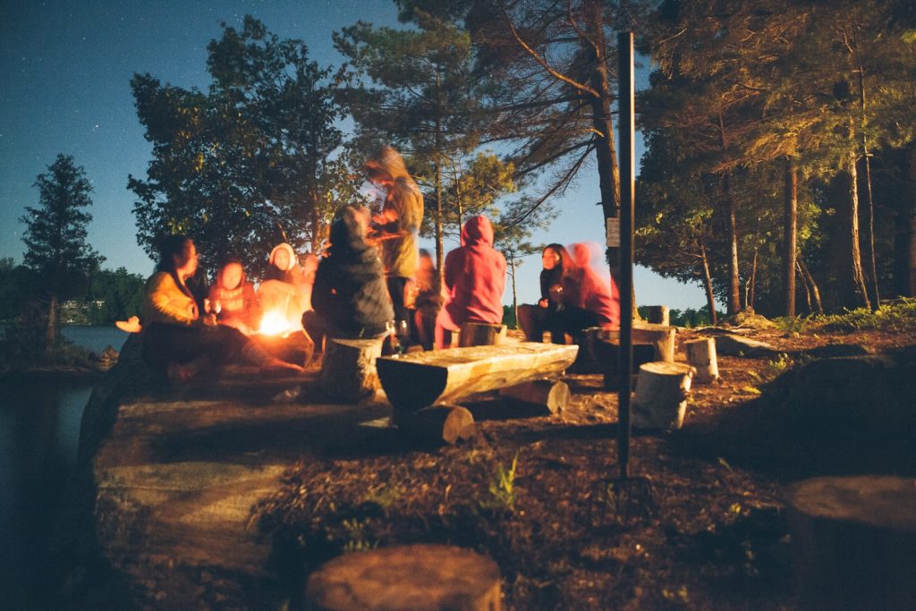 cozy camping by a fire